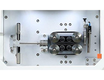 送りベルト・切断部